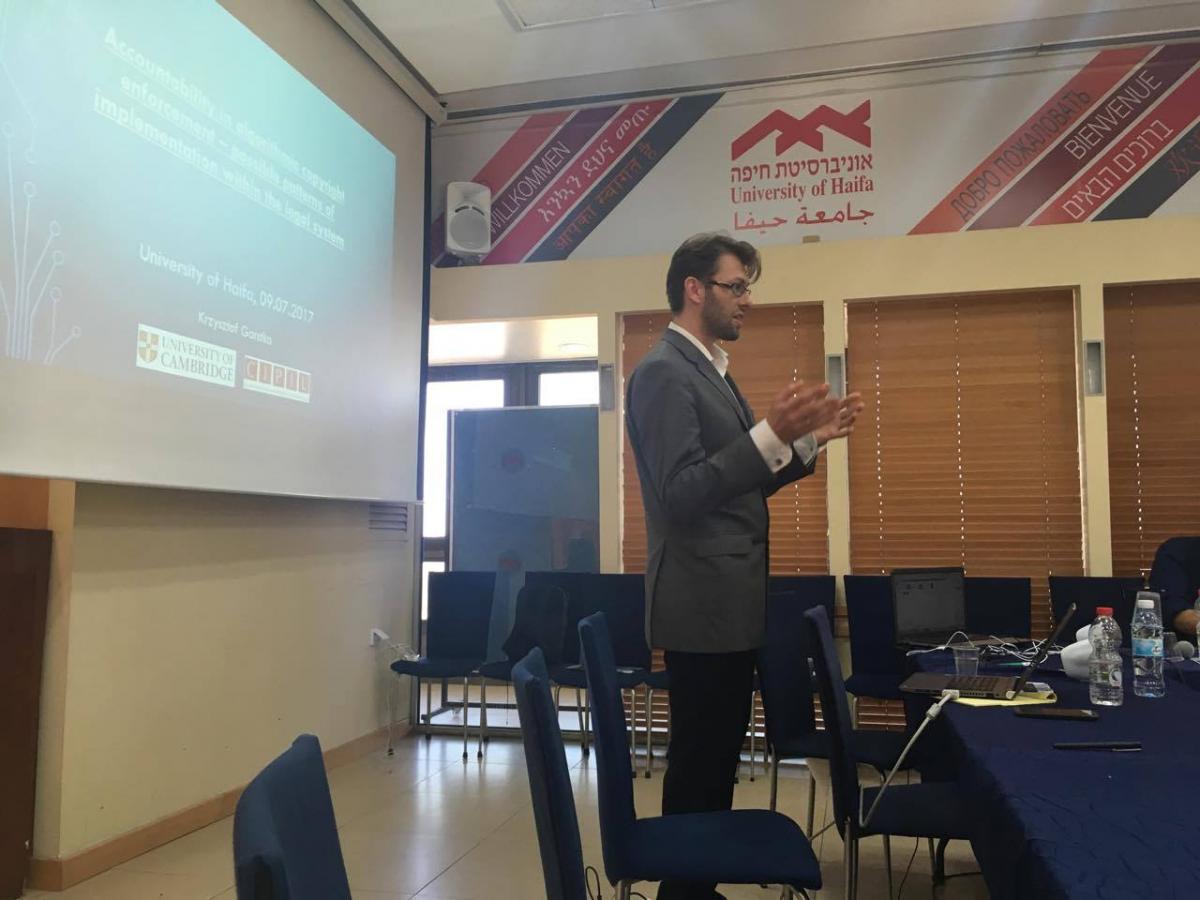 Krzsztof gives his talk